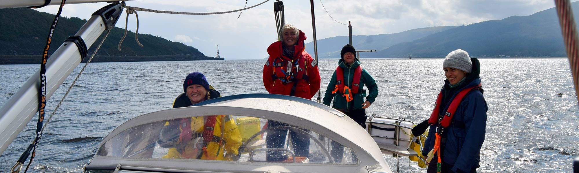 Friendly boat crew enjoying a sail